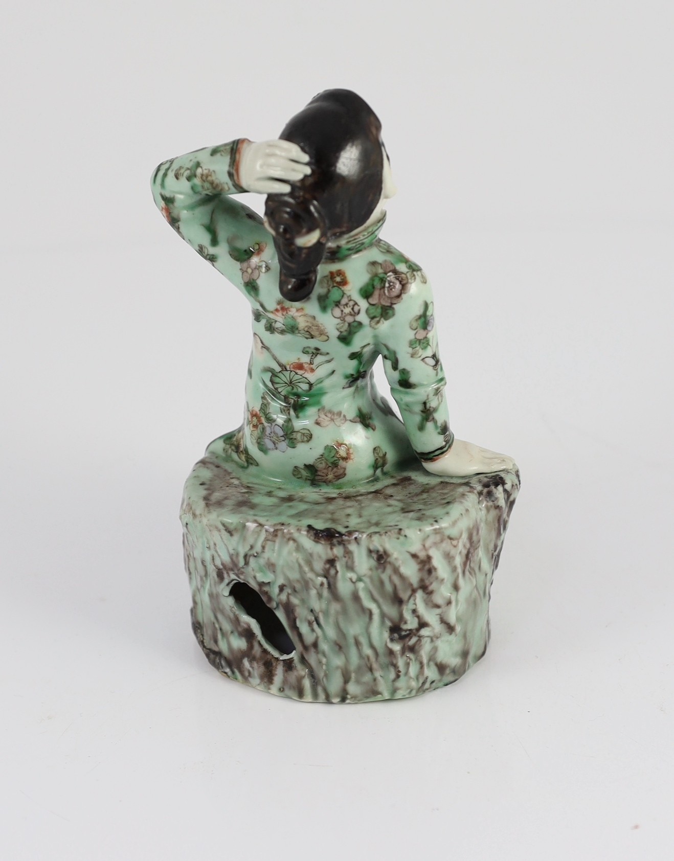 A Chinese enamelled porcelain figure of a Han Chinese woman, late 19th century, 16cm high